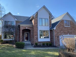 Front elevation of home with closed garage door