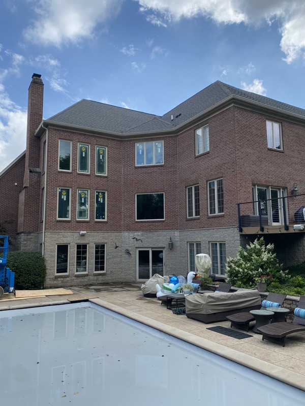 Rear of home with many windows