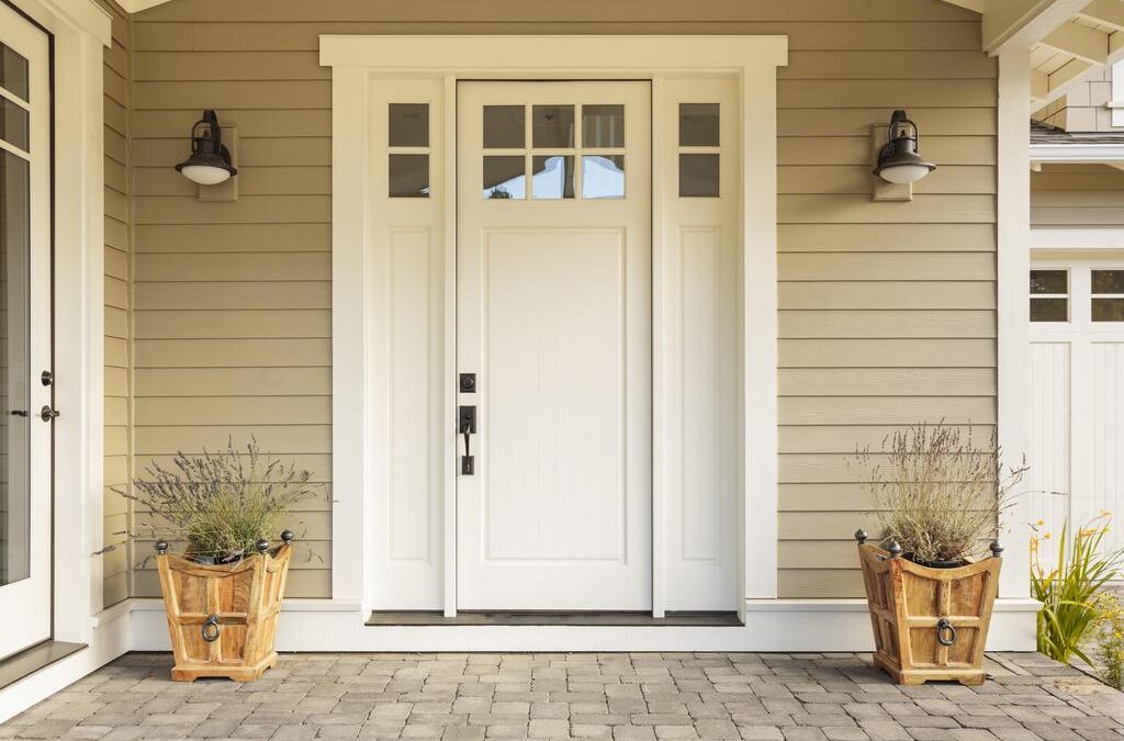 A clean front entryway with a new modern front door