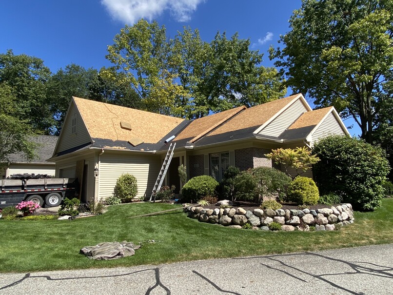 Home in process of roof replacement