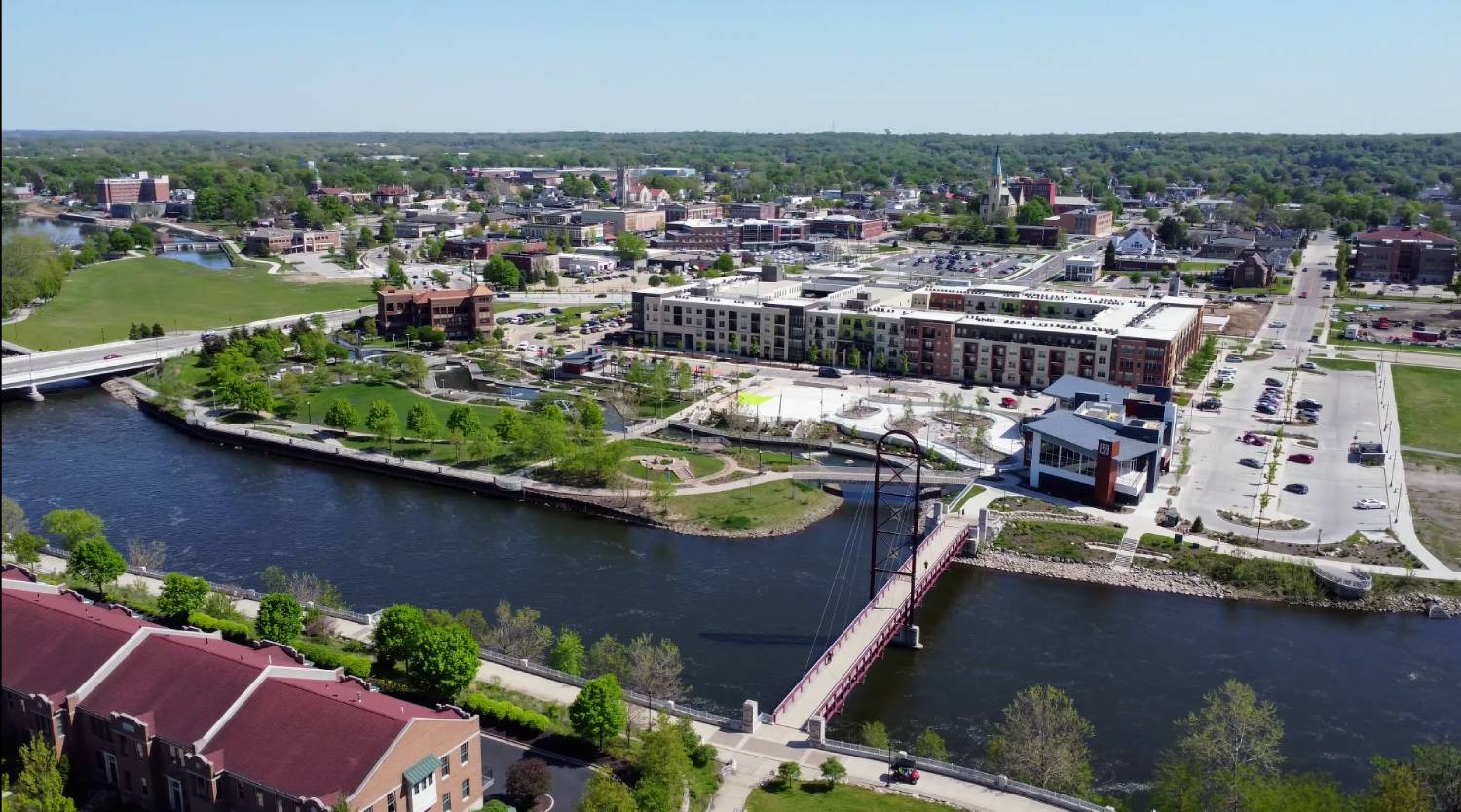 A river with a bridge in the city of Mishawaka