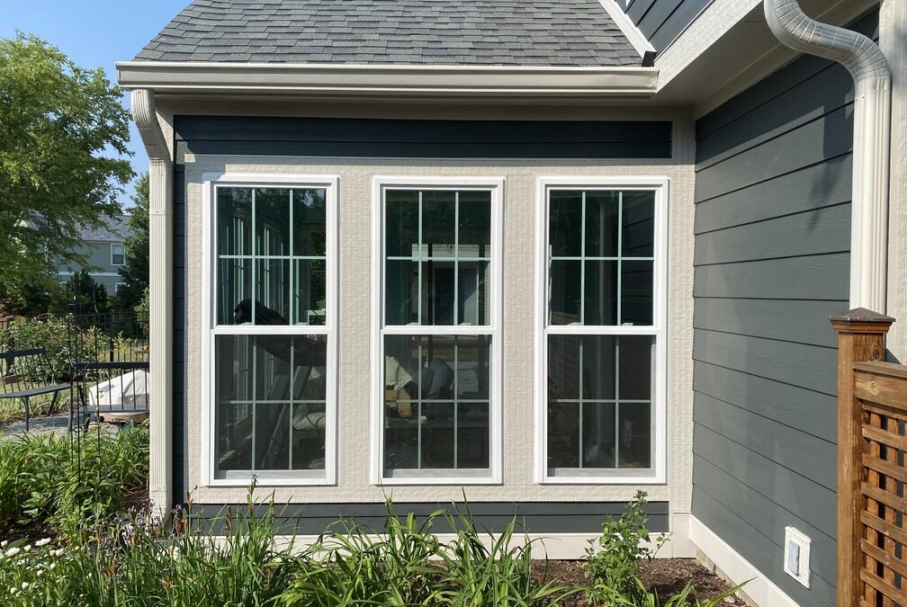New energy-efficient windows on the side of home
